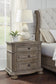 Ardenfield King Upholstered Sleigh Bed with Mirrored Dresser and Nightstand